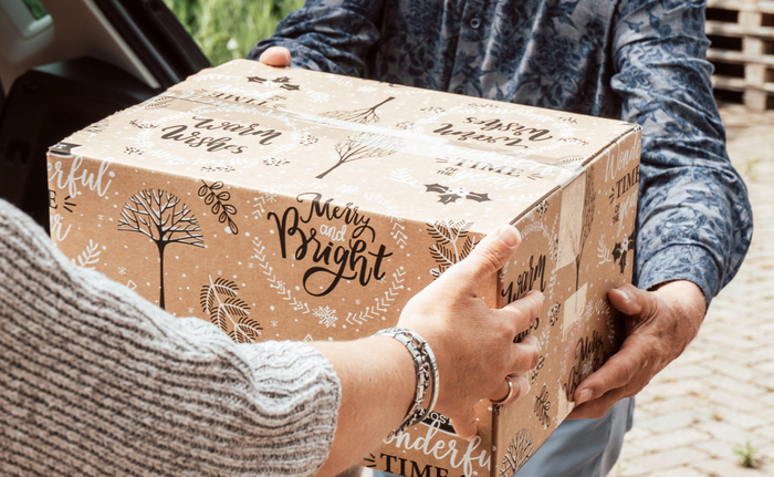 Maatwerk kerstpakket met uitgiftebeleving